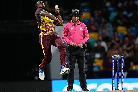 Obed McCoy bowls against USA